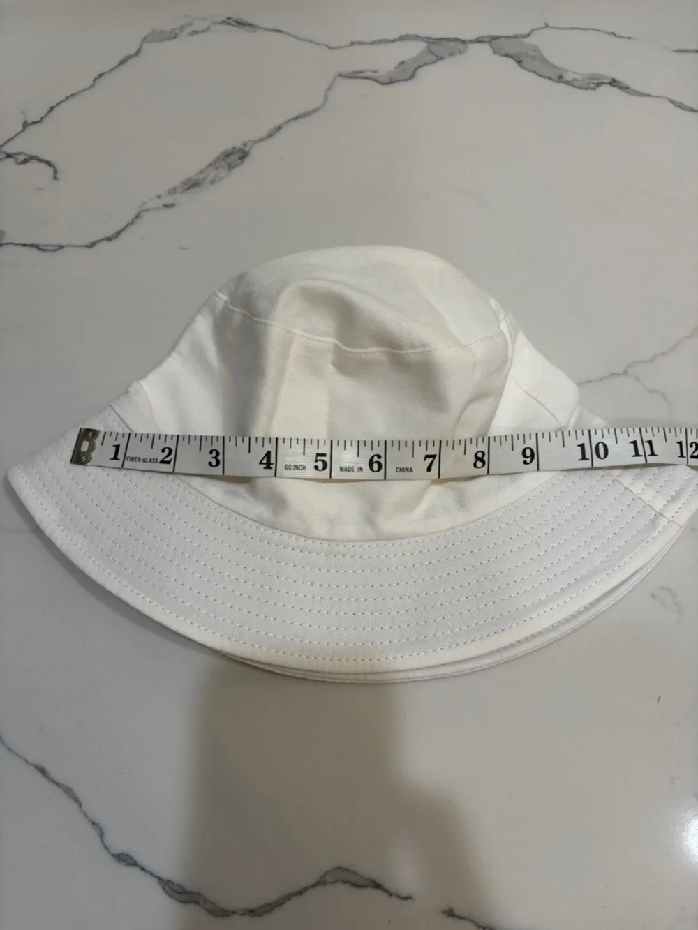 White bucket hat
